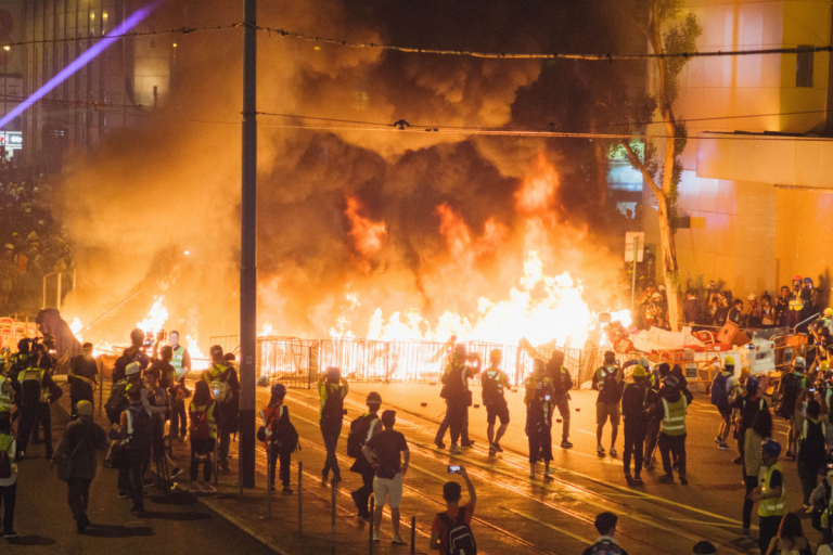Hong Kong High Rise Fire Kills 13 and Injures Dozens